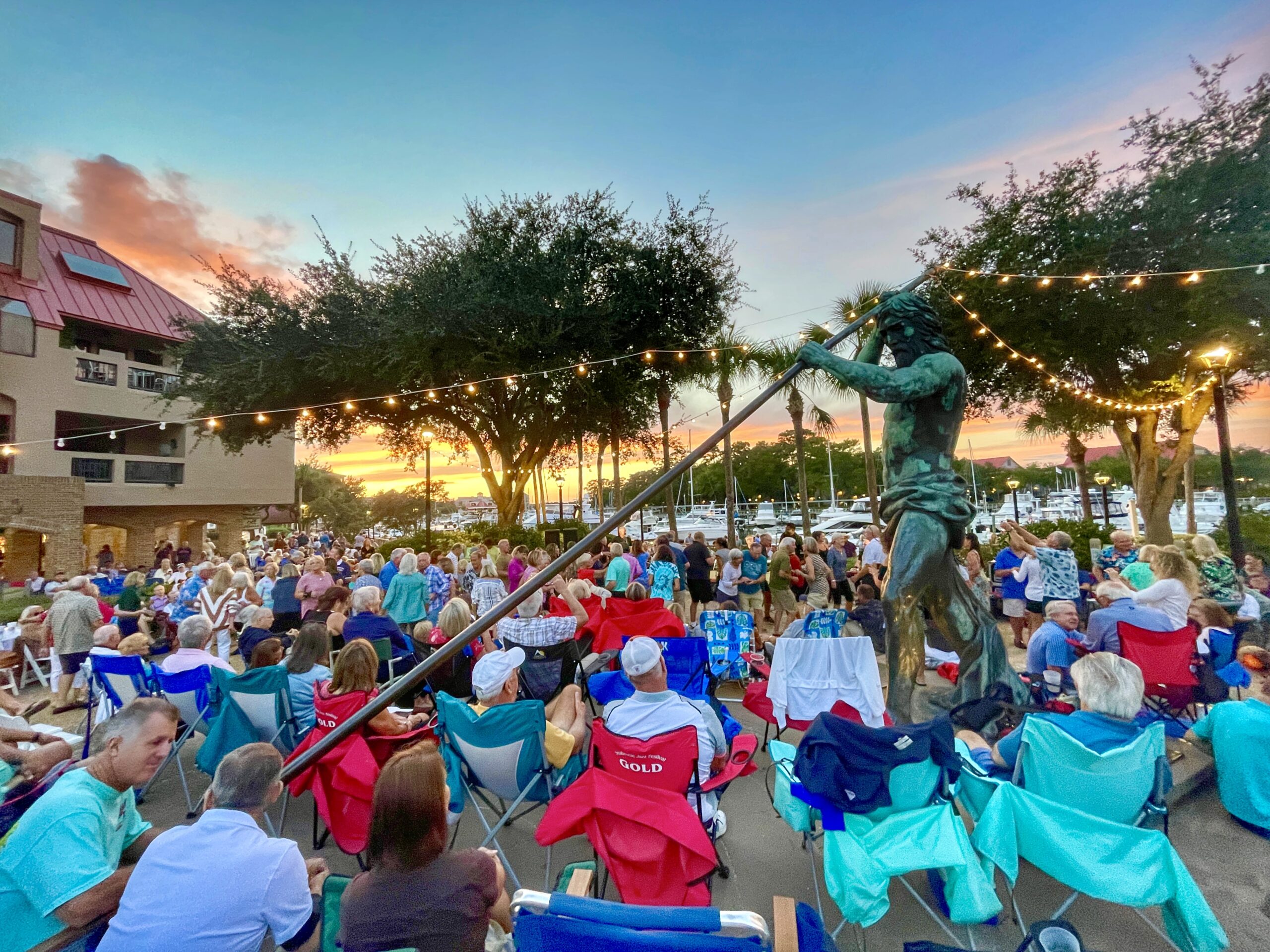 Music & Taste at Shelter Cove Harbour & Marina Neptune Statue
